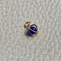 18k gold caged blue stone pendant or charm