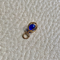 18k gold caged blue stone pendant or charm