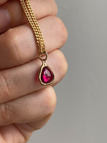 18k gold transparent red stone puffy droplet pendant or charm