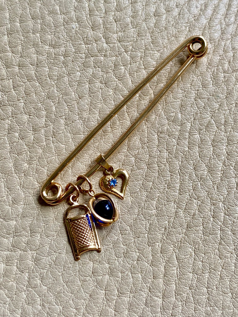 18k gold heart with blue stone pendant or charm