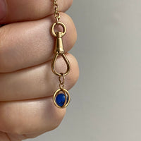 18k gold caged blue stone pendant or charm