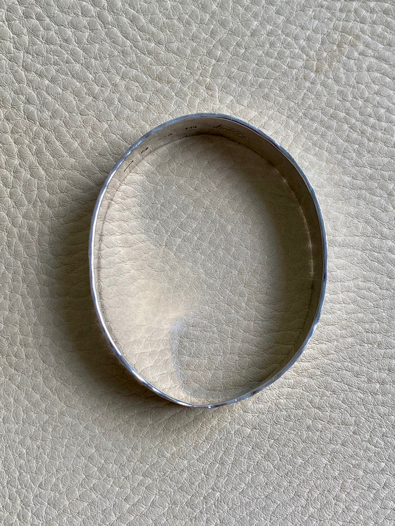 1974 Heavy hammered texture silver bangle by Kuhlin - size 8 inch interior